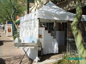 Cookit solar oven next to the craft booth