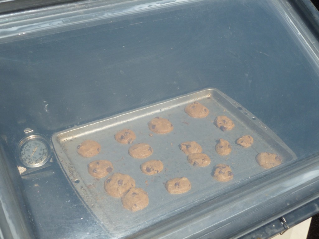 Chocolate chip cookies baking in the SOS Sport solar oven