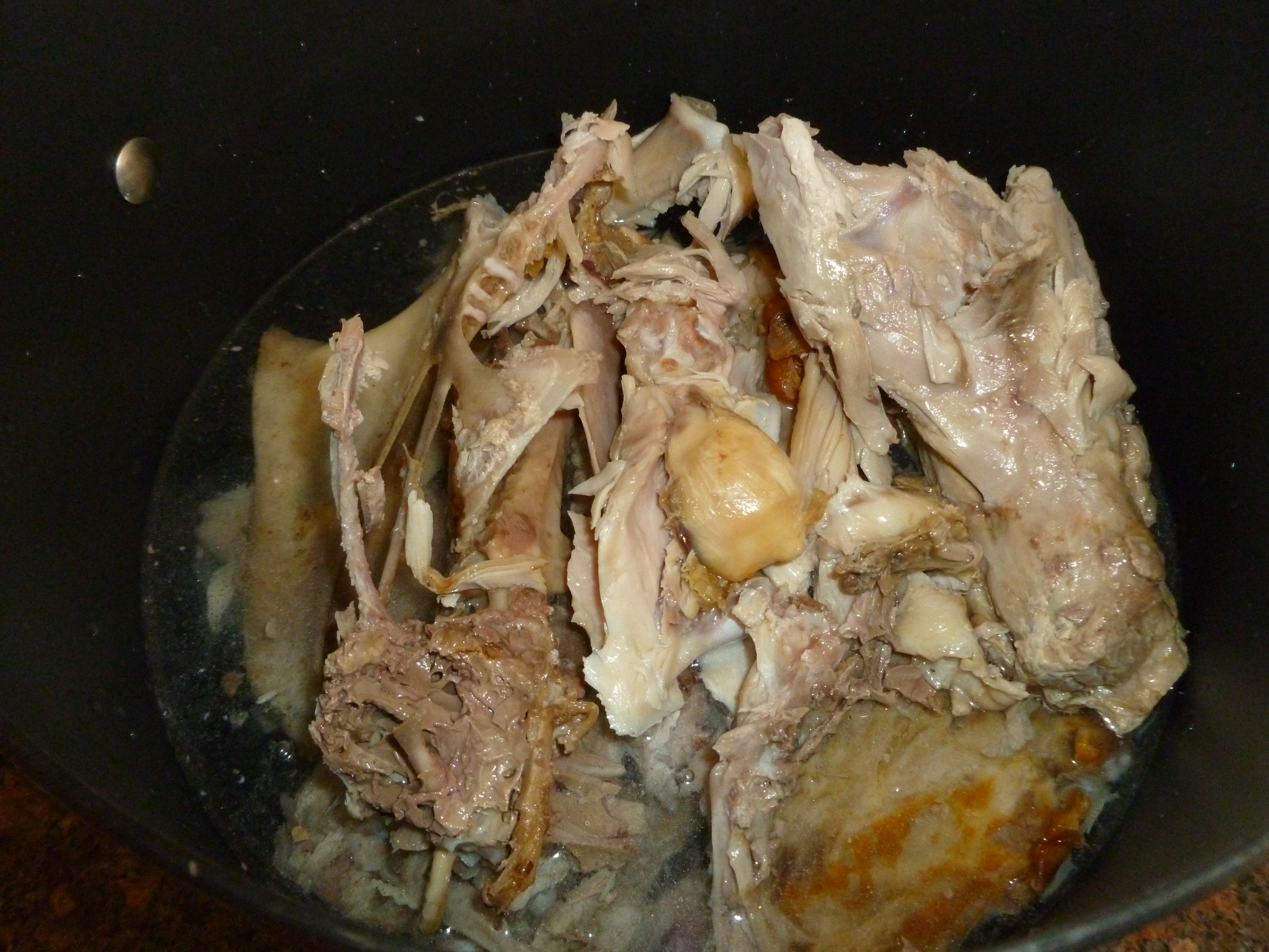 Place turkey carcass in a large pot and cover with water.